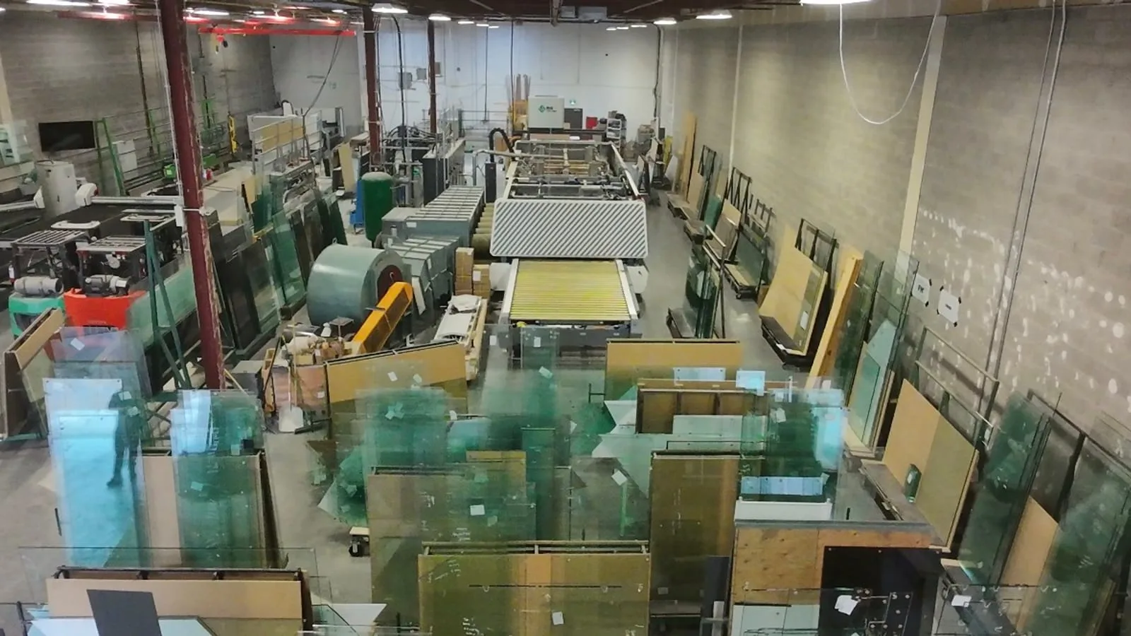 Glass panels staged and organized at Vivid's Mississauga shop